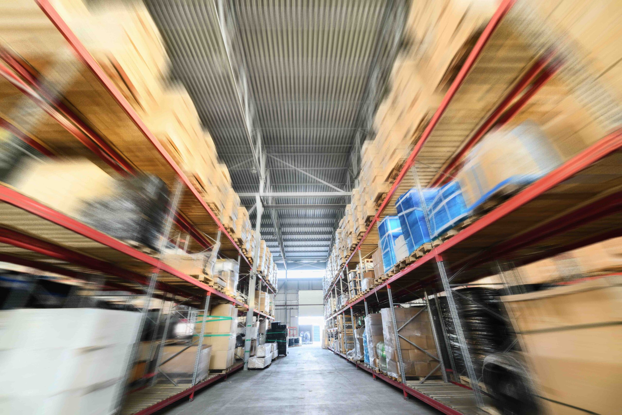 Long shelves with a variety of boxes and containers.